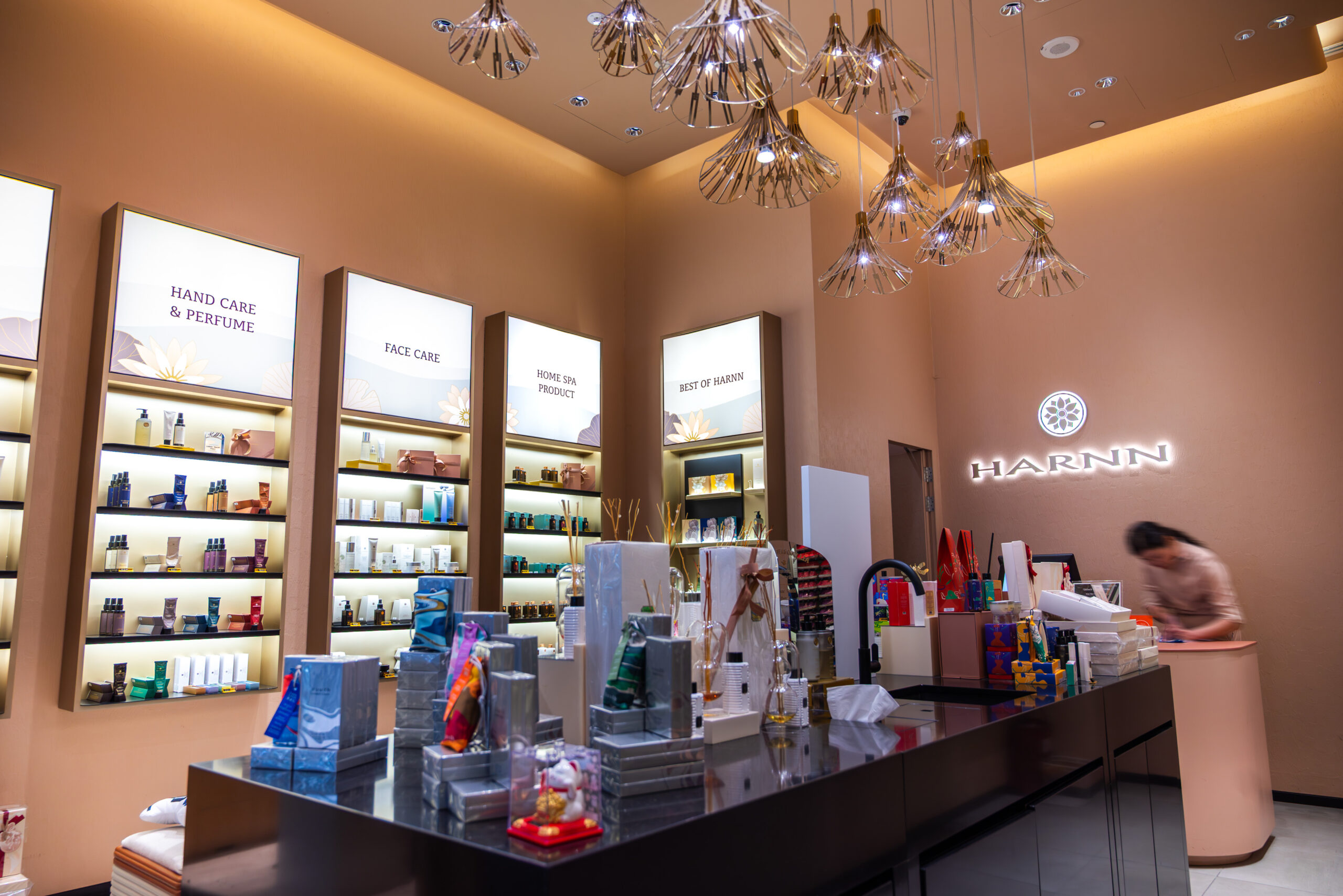 HARNN retail counter with natural skincare products and warm interior finishes