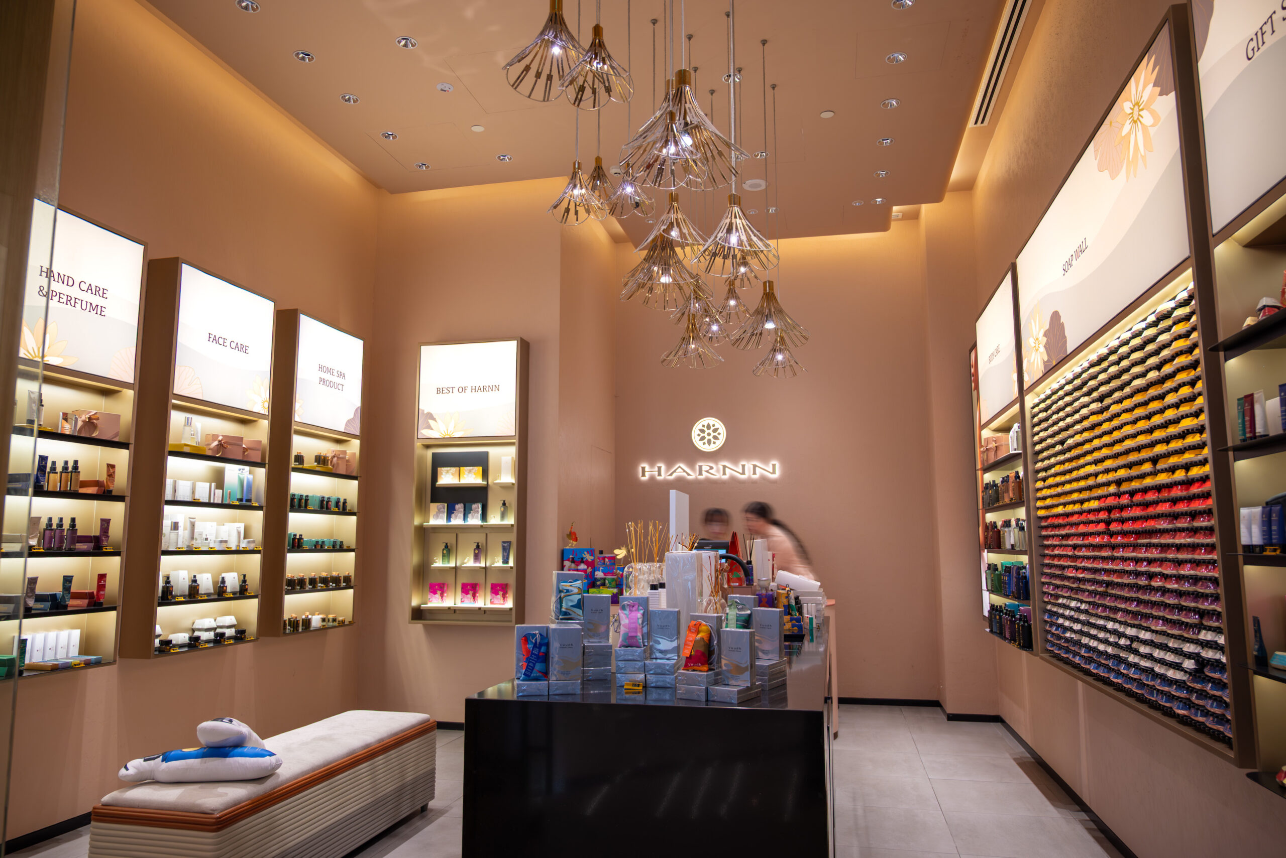 HARNN skincare store with custom illuminated product shelving