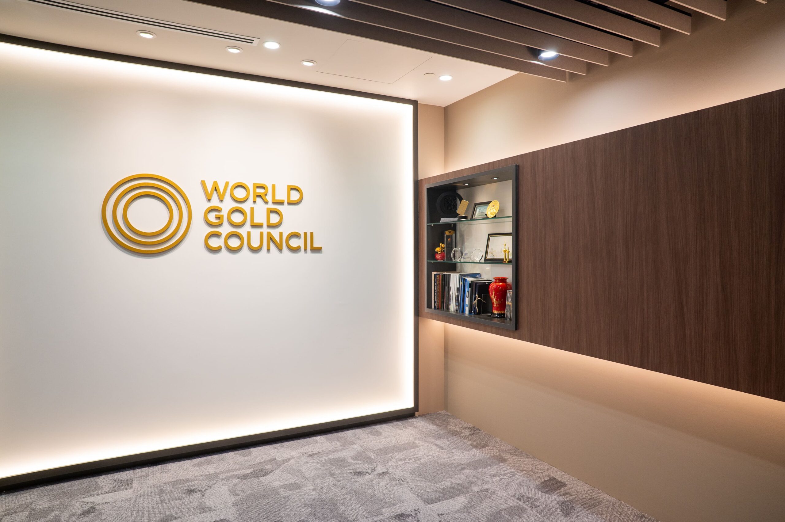 World Gold Council reception with illuminated logo and timber ceiling