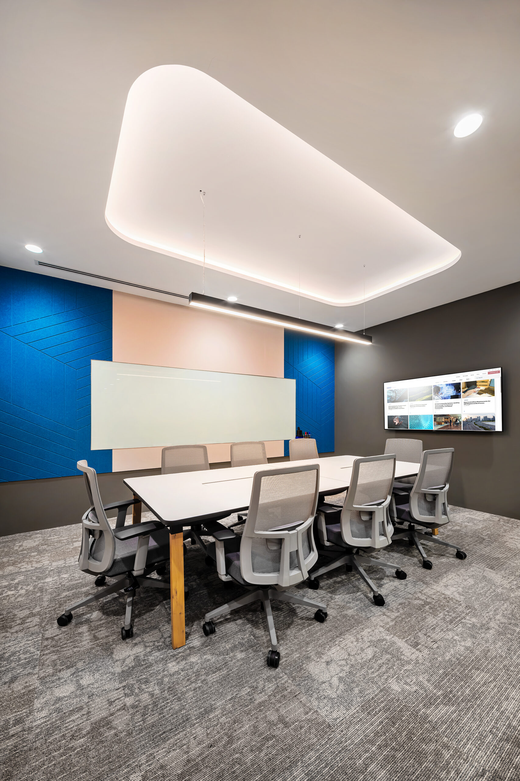 BDO office brainstorming area with booth seating and writable glass wall