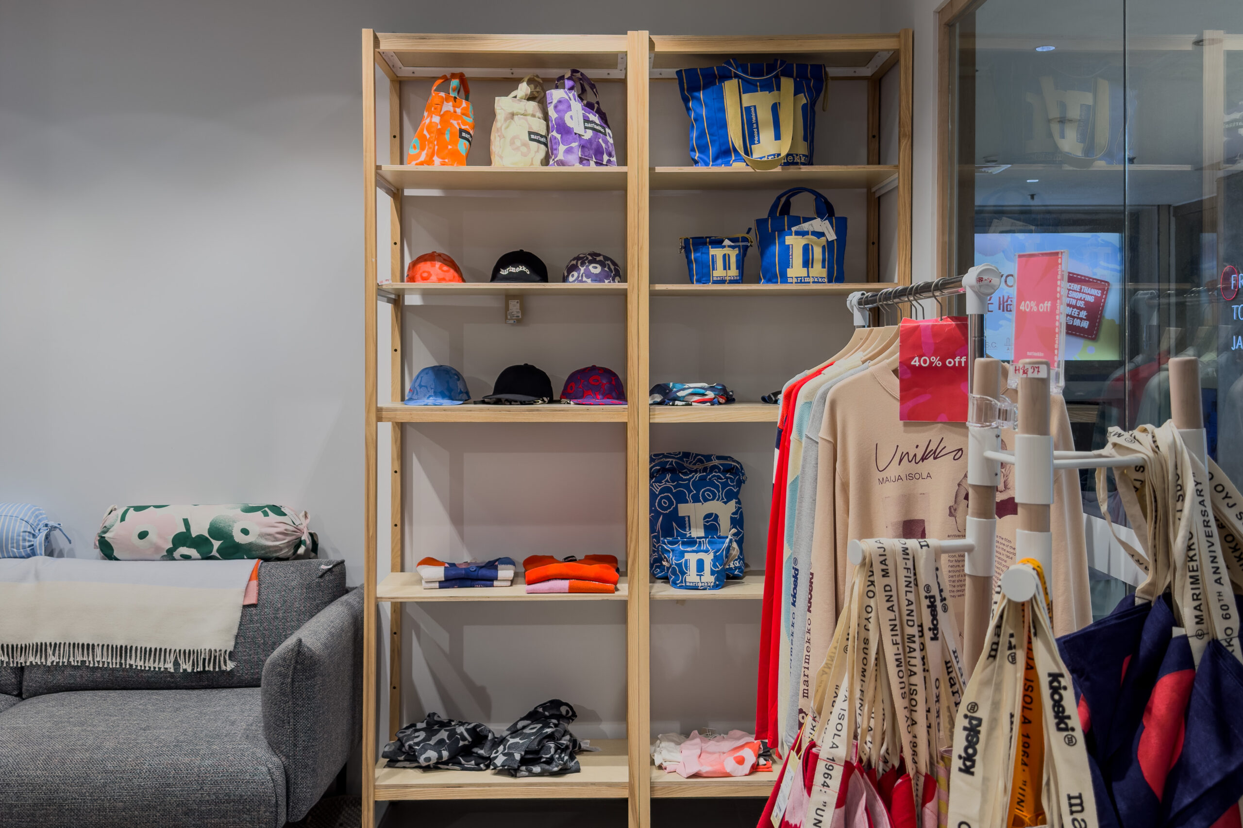 Marimekko accessories display with bags, hats and timber shelving at Ngee Ann City