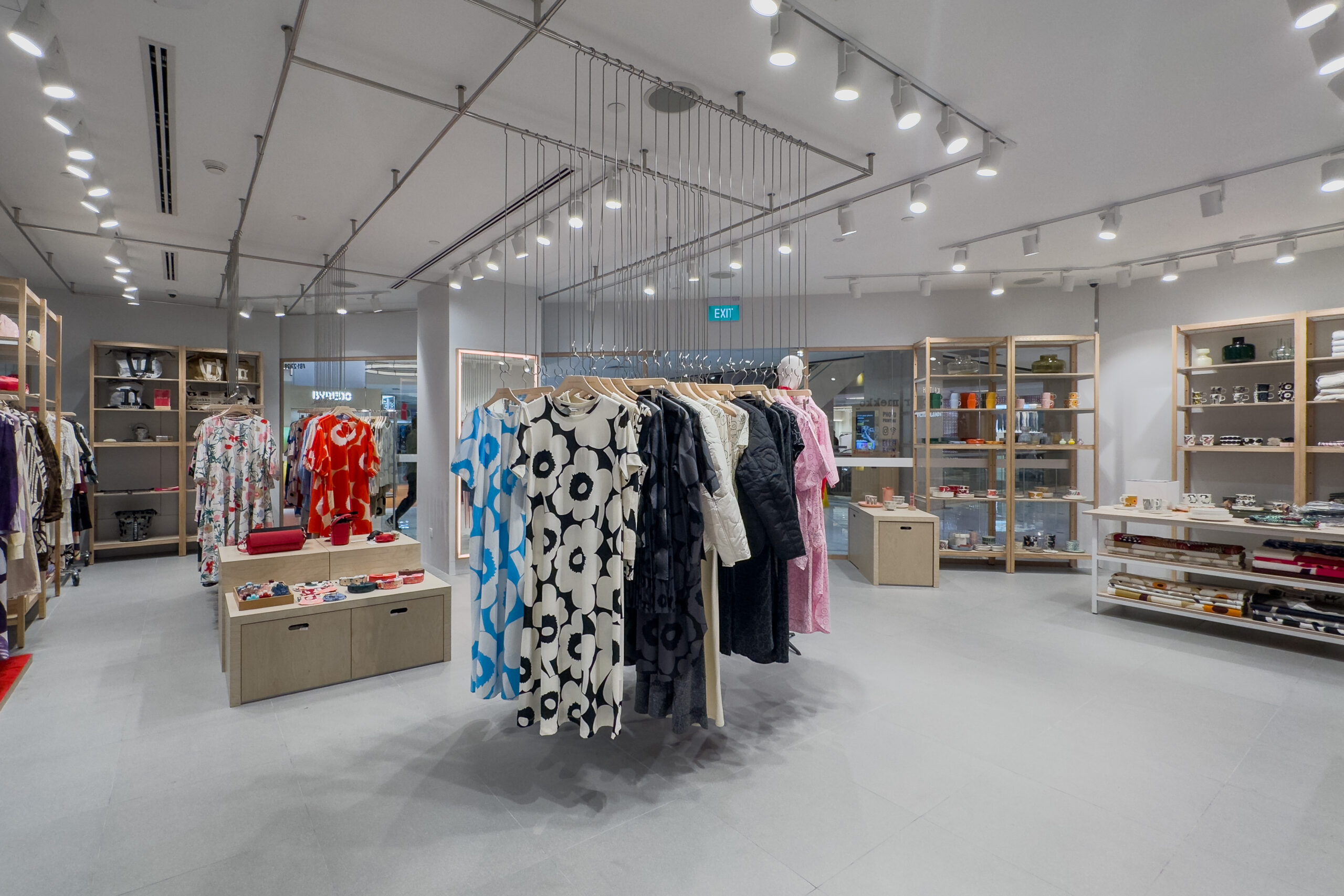 Marimekko fashion and homeware display with white oak retail fixtures