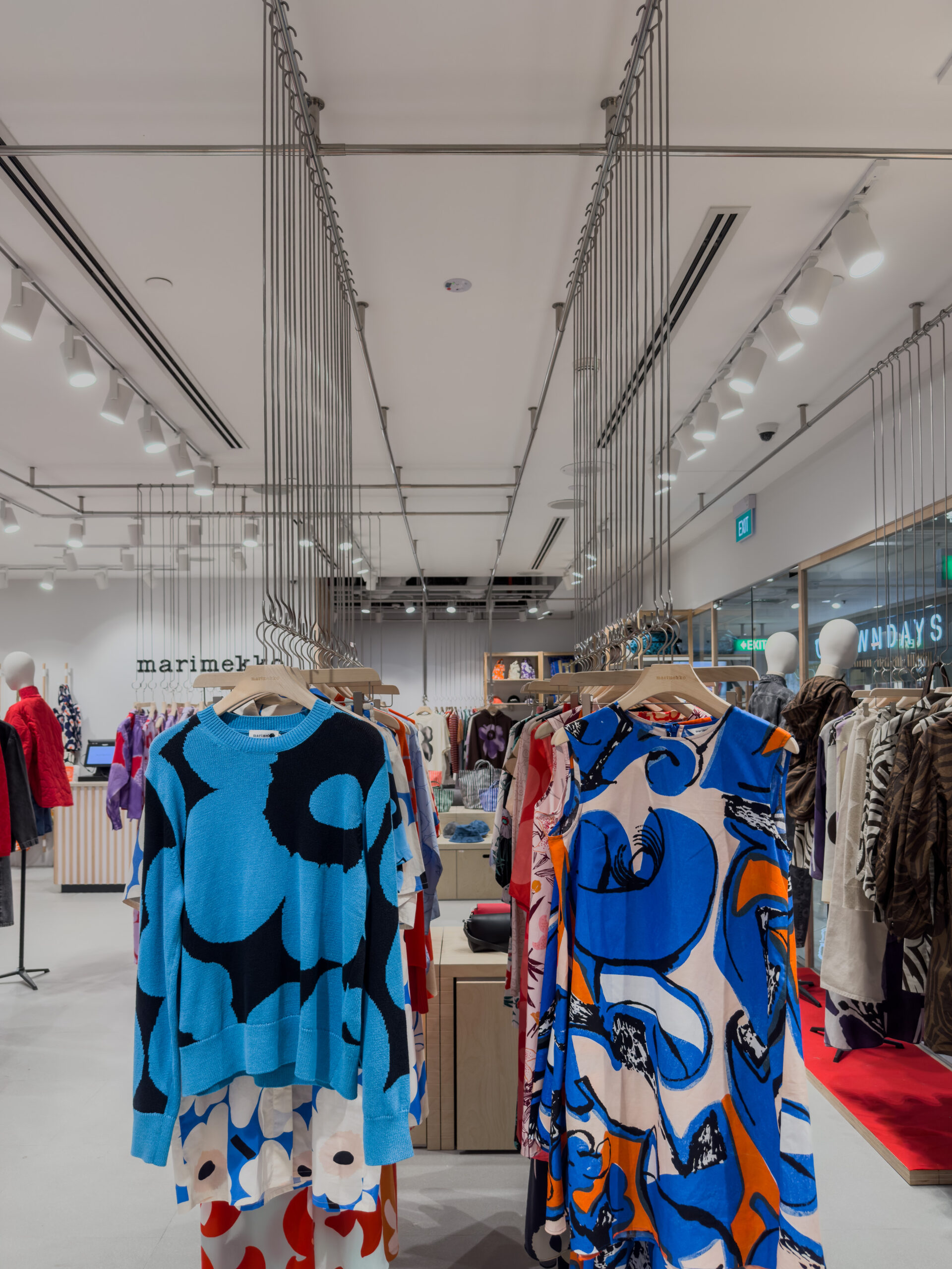 Marimekko accessories display with bags, hats and timber shelving at Ngee Ann City