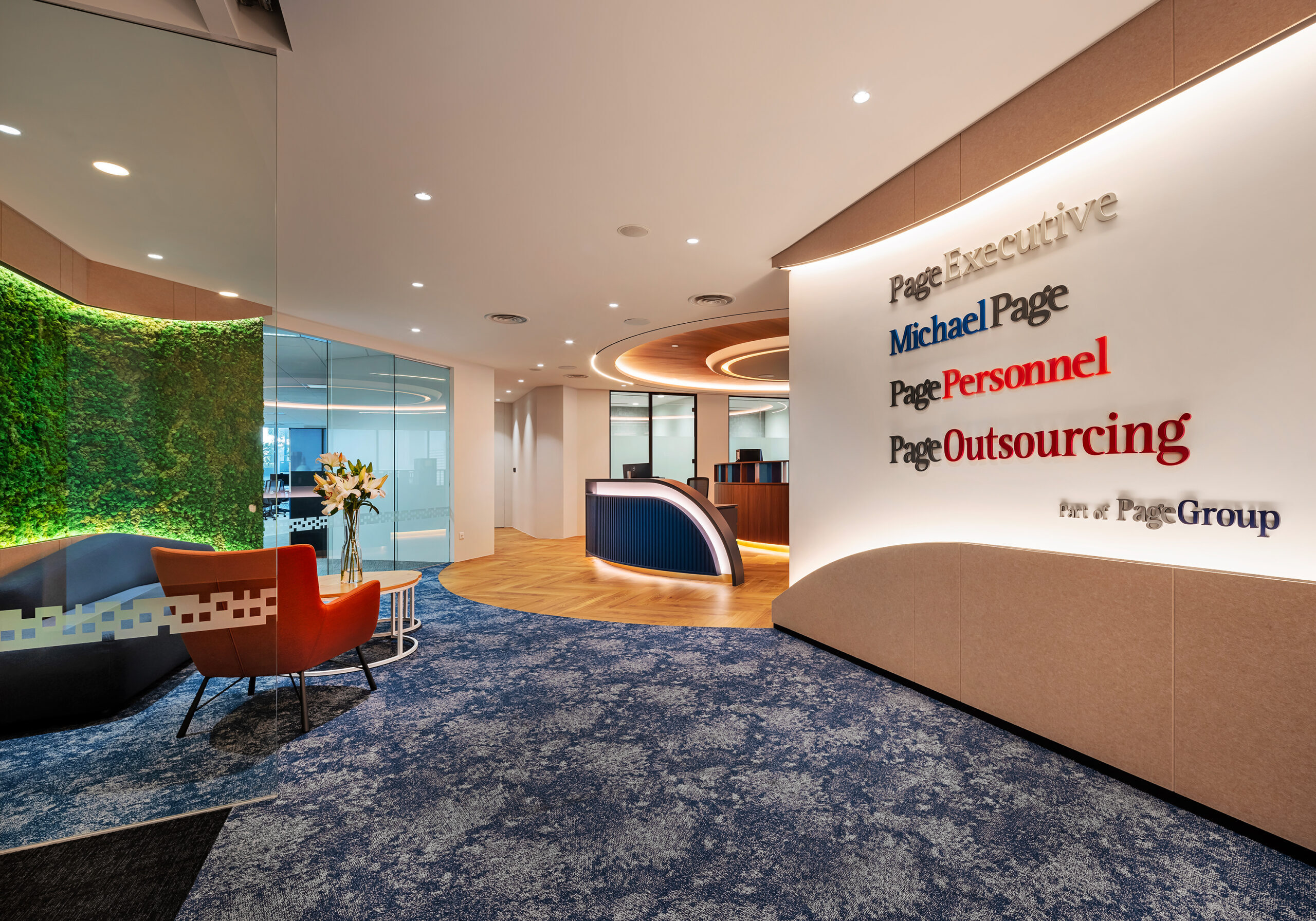 Michael Page reception lounge with biophilic wall and comfortable seating