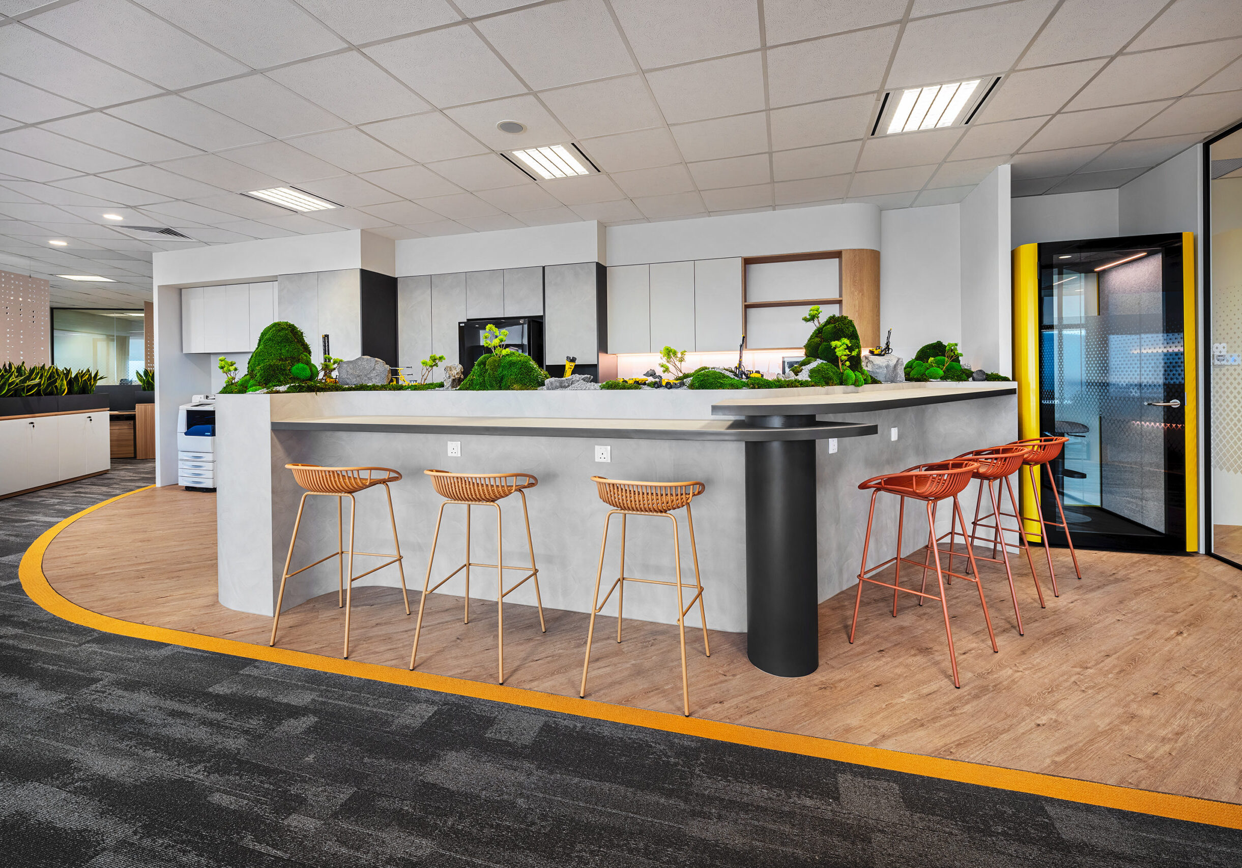Epiroc workplace pantry with high counter and biophilic display