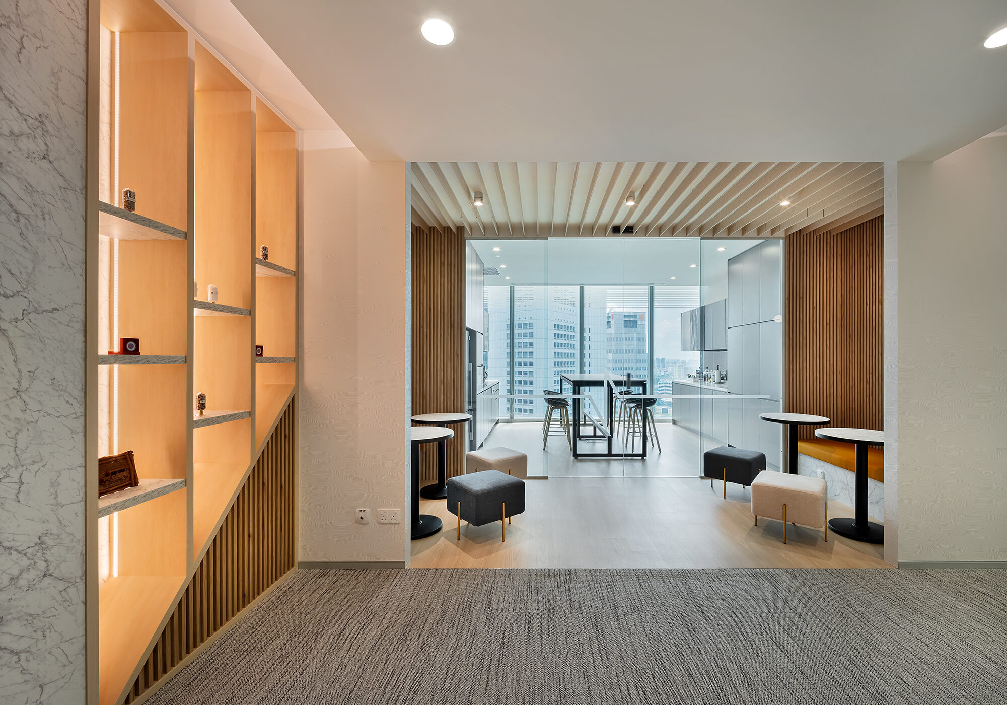 CBMM pantry and informal meeting area with timber finishes and city views