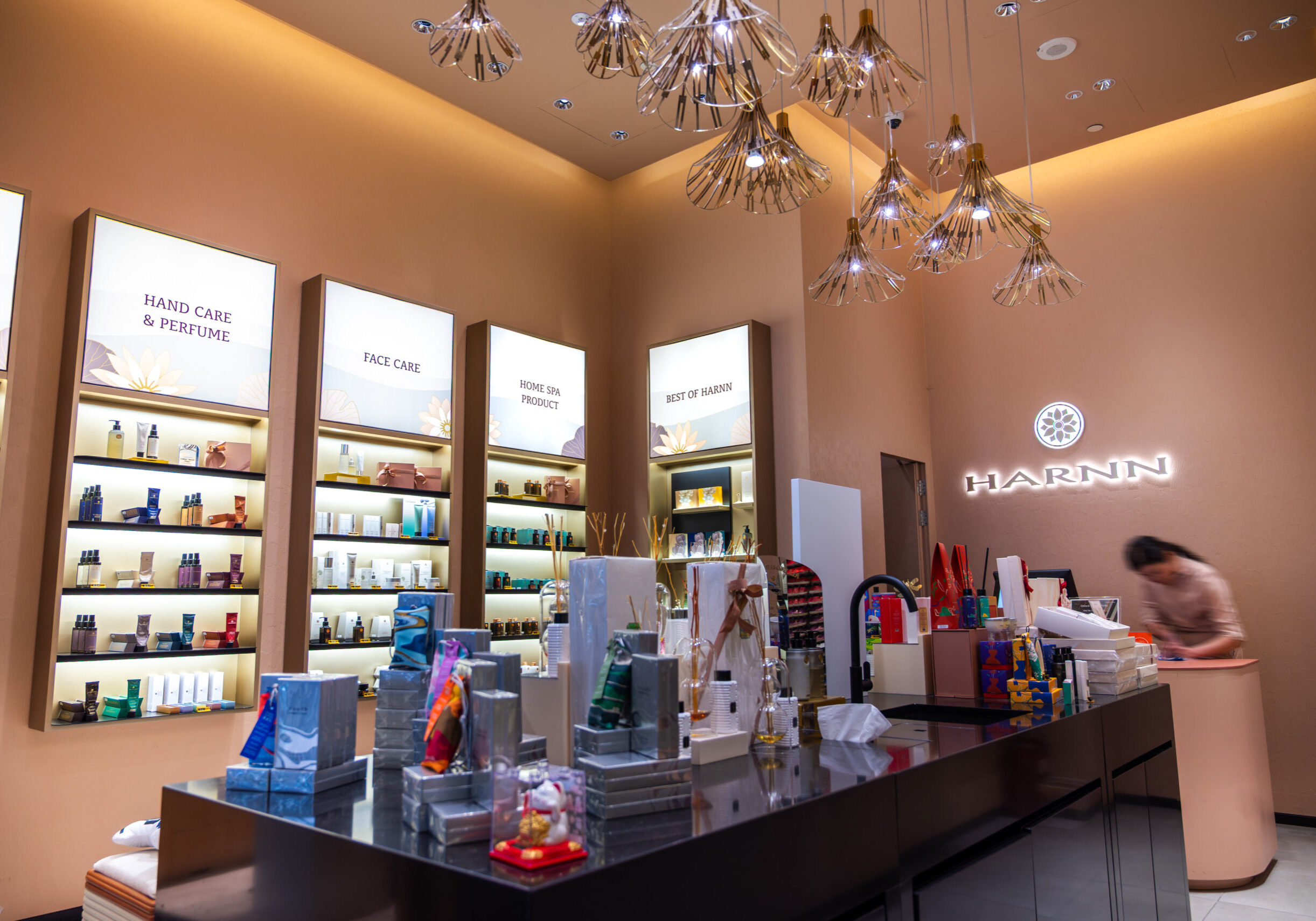 HARNN retail counter with natural skincare products and warm interior finishes