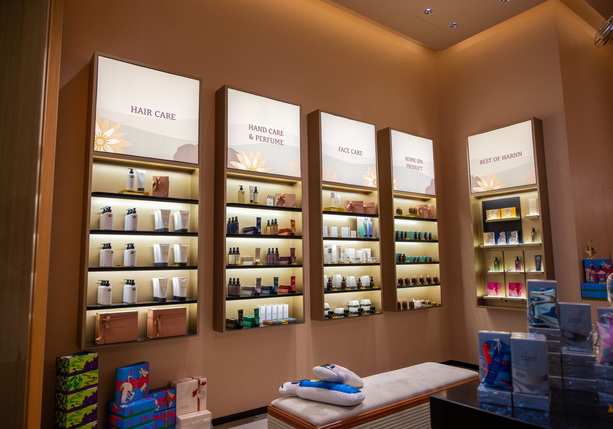 HARNN skincare product shelves organised by wellness category