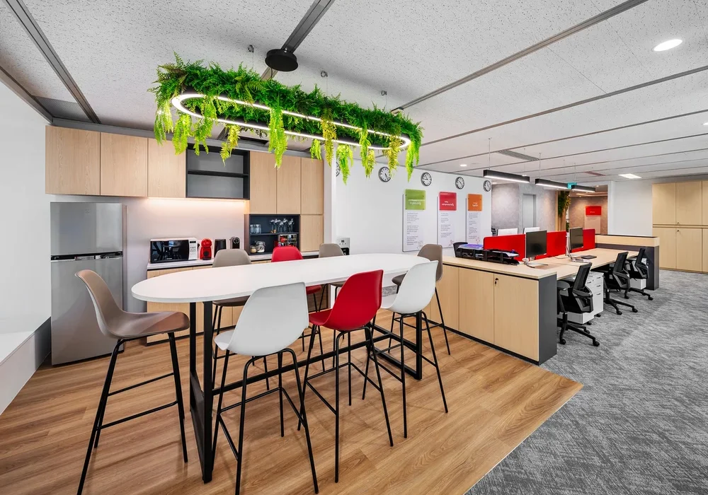 Intersnack office pantry beside open workstations in Singapore
