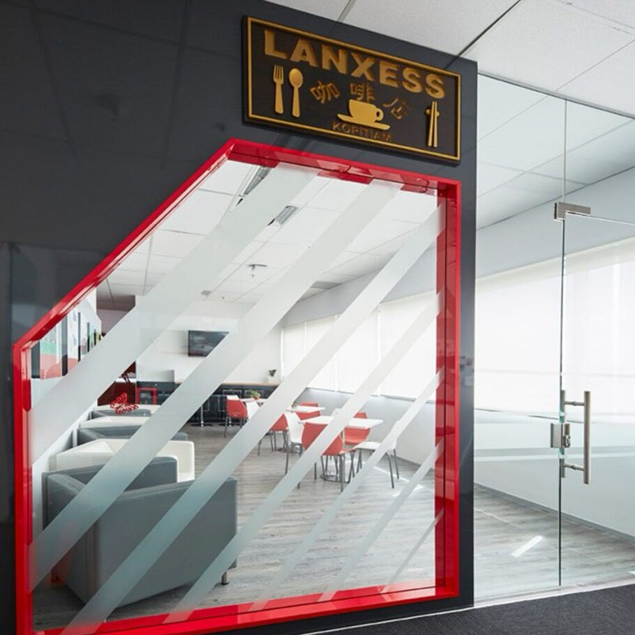 LANXESS office pantry with frosting glass panel and local Kopitiam-inspired signboard