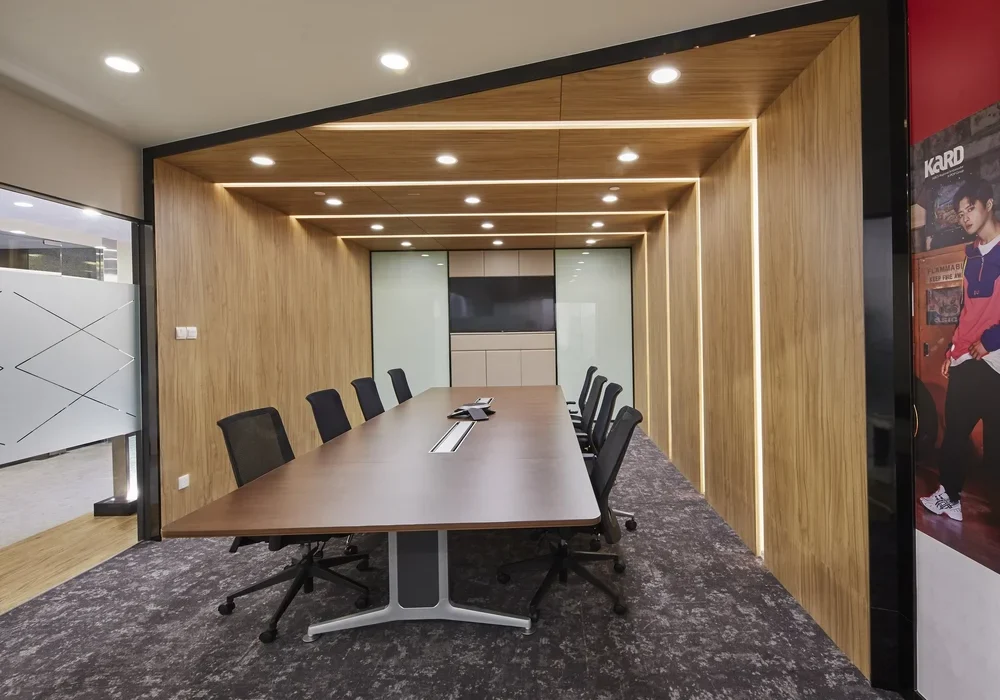 ASICS executive boardroom with timber wall panels and integrated lighting