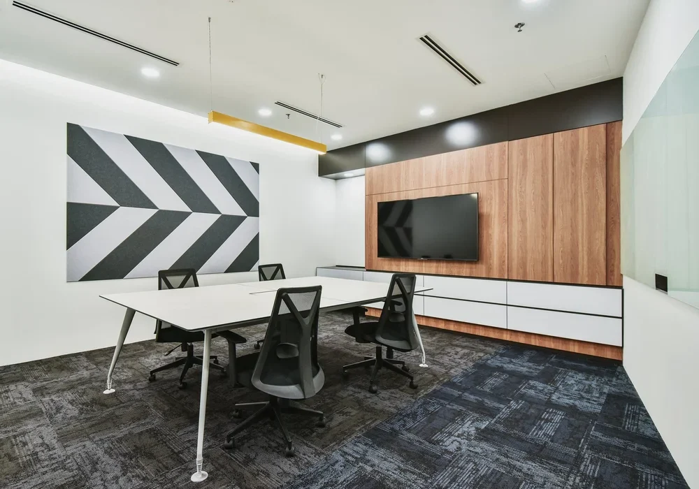 Zimmer Biomet meeting room with timber feature wall and presentation screen