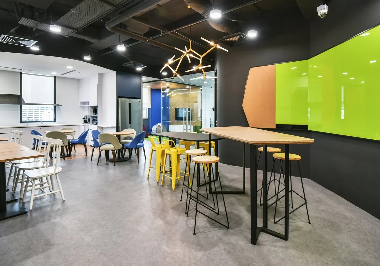 Zimmer Biomet office breakout area with colourful café seating and bar stools