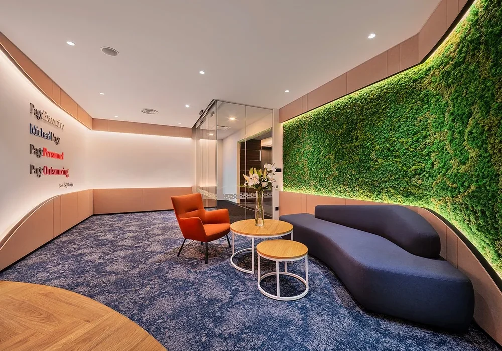 Michael Page reception lounge with biophilic wall and comfortable seating
