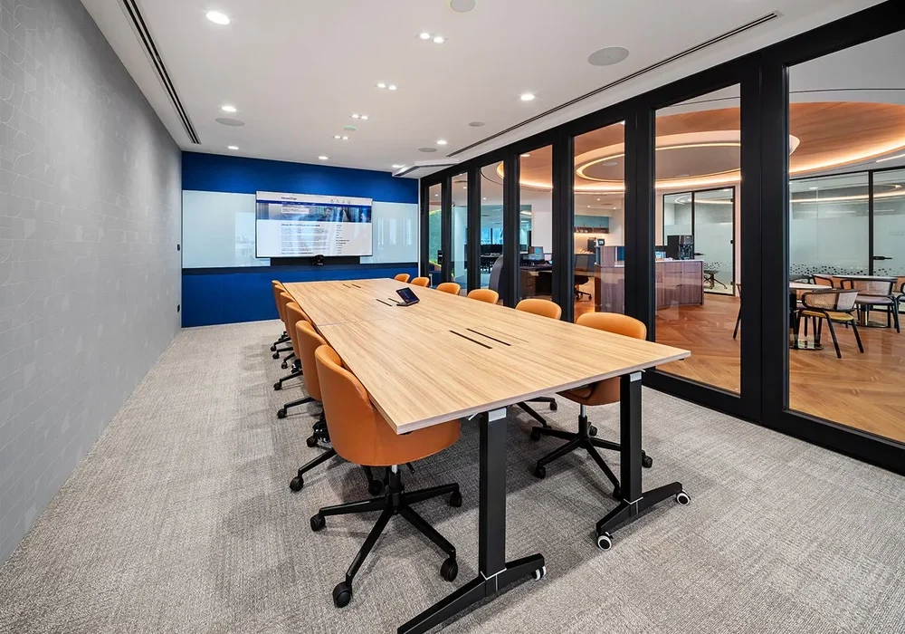 Michael Page meeting room with presentation screen and CBD office views