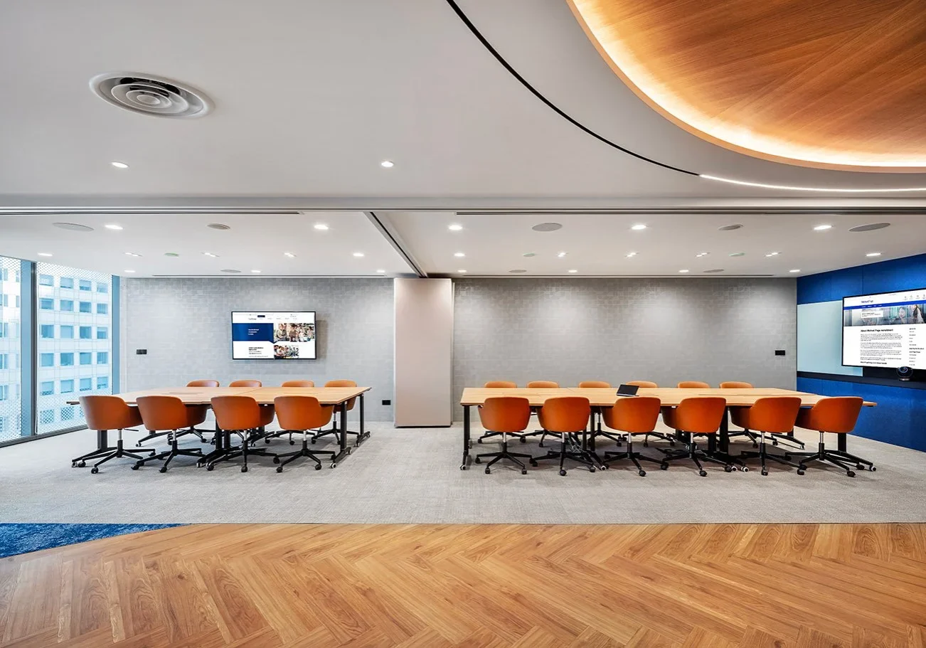 Michael Page meeting room with presentation screen and CBD office views